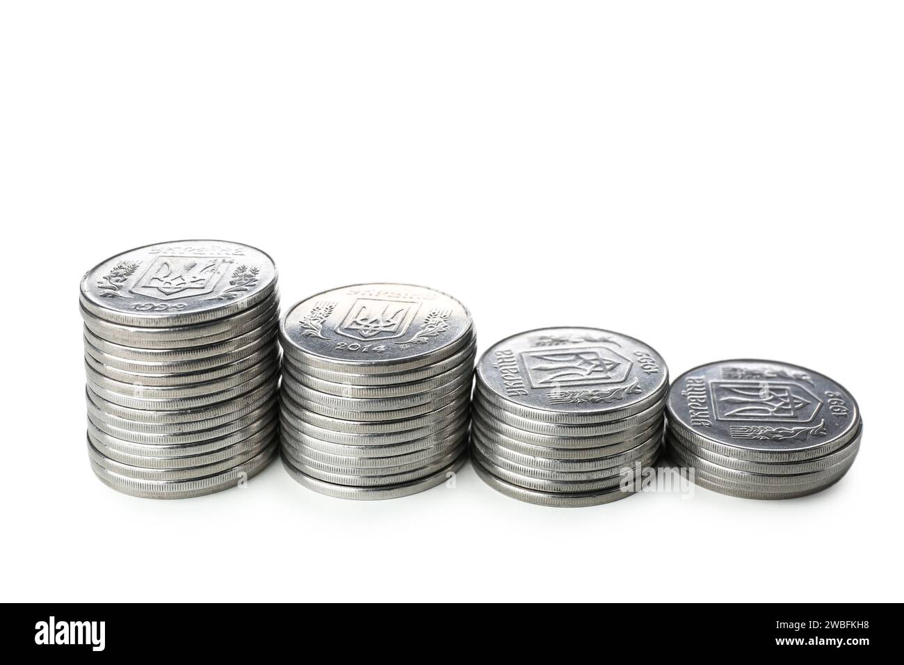 Stacks of coins isolated on white background Stock Photo - Alamy