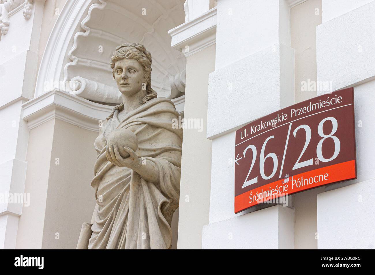 Warsaw, Poland. Statue of Urania, Greek muse of astronomy and astrology, at the entrance gate to the main campus of the University of Warsaw Stock Photo