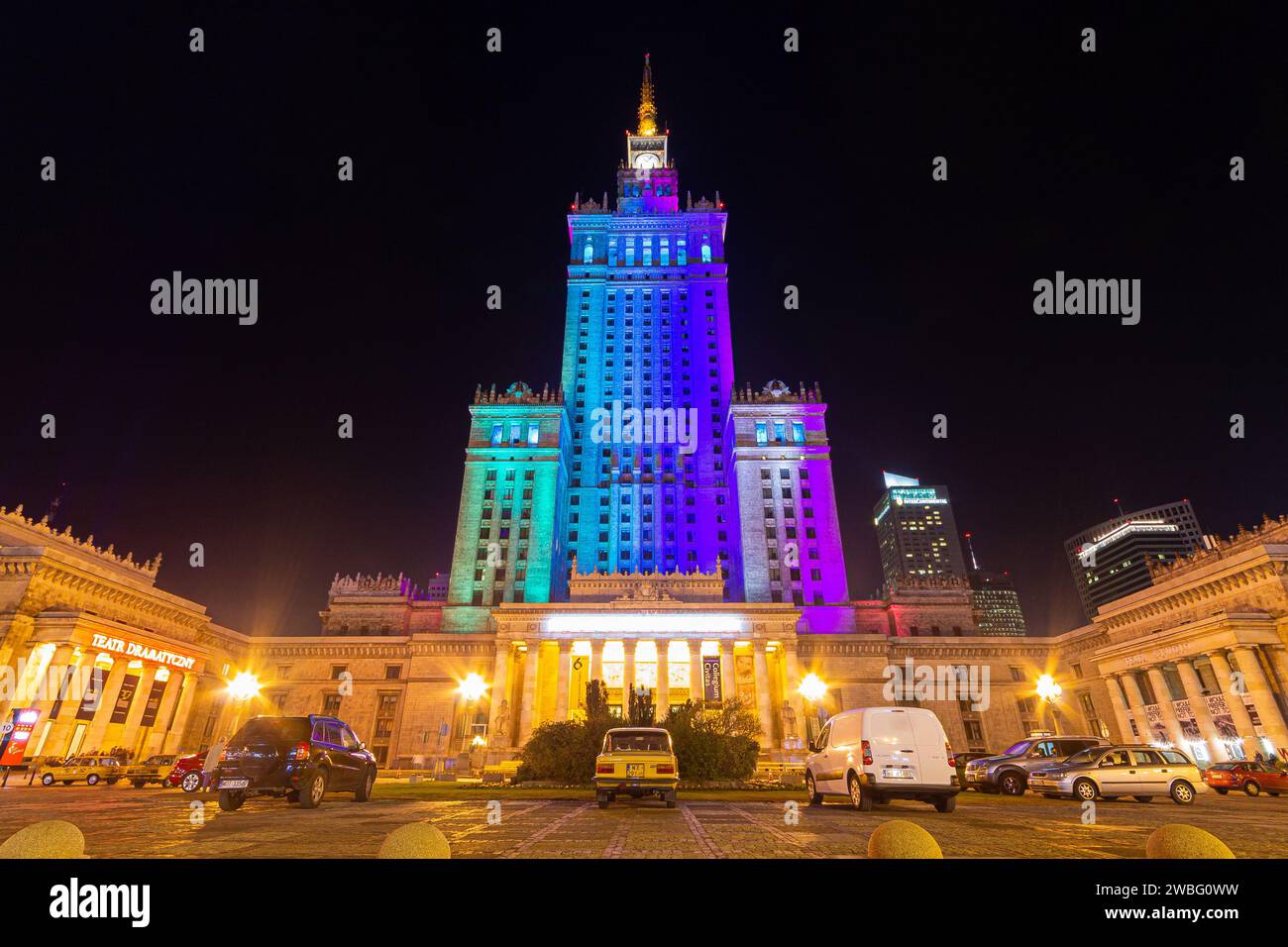 Warsaw, Poland. The Palace of Culture and Science (Palac Kultury i Nauki - PKiN) illuminated at night in many colors Stock Photo