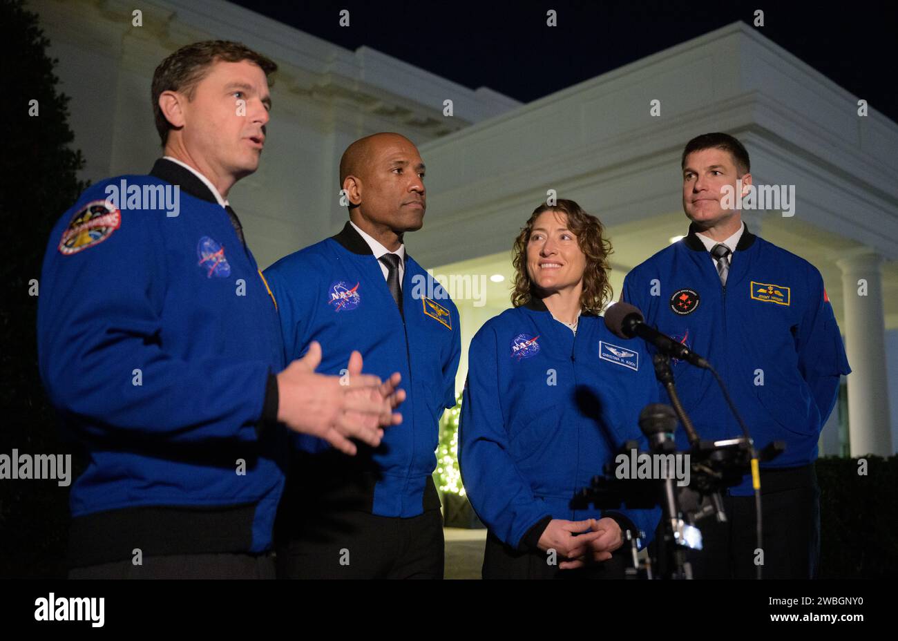 Artemis II crew members: NASA astronauts Reid Wiseman, left, Victor Glover, and Christina Koch, and CSA (Canadian Space Agency) astronaut Jeremy Hansen, right, speak to reporters after their meetings with U.S. President Joe Biden and U.S. Vice President Kamala Harris at the White House in Washington, Thursday, Dec. 14, 2023. During their mission, the Artemis II crew will travel aboard NASA's Orion spacecraft on a 10-day mission around the Moon, testing spacecraft systems for the first time with astronauts for long-term exploration and scientific discovery. Photo Credit: (NASA/Bill Ingalls) Stock Photo