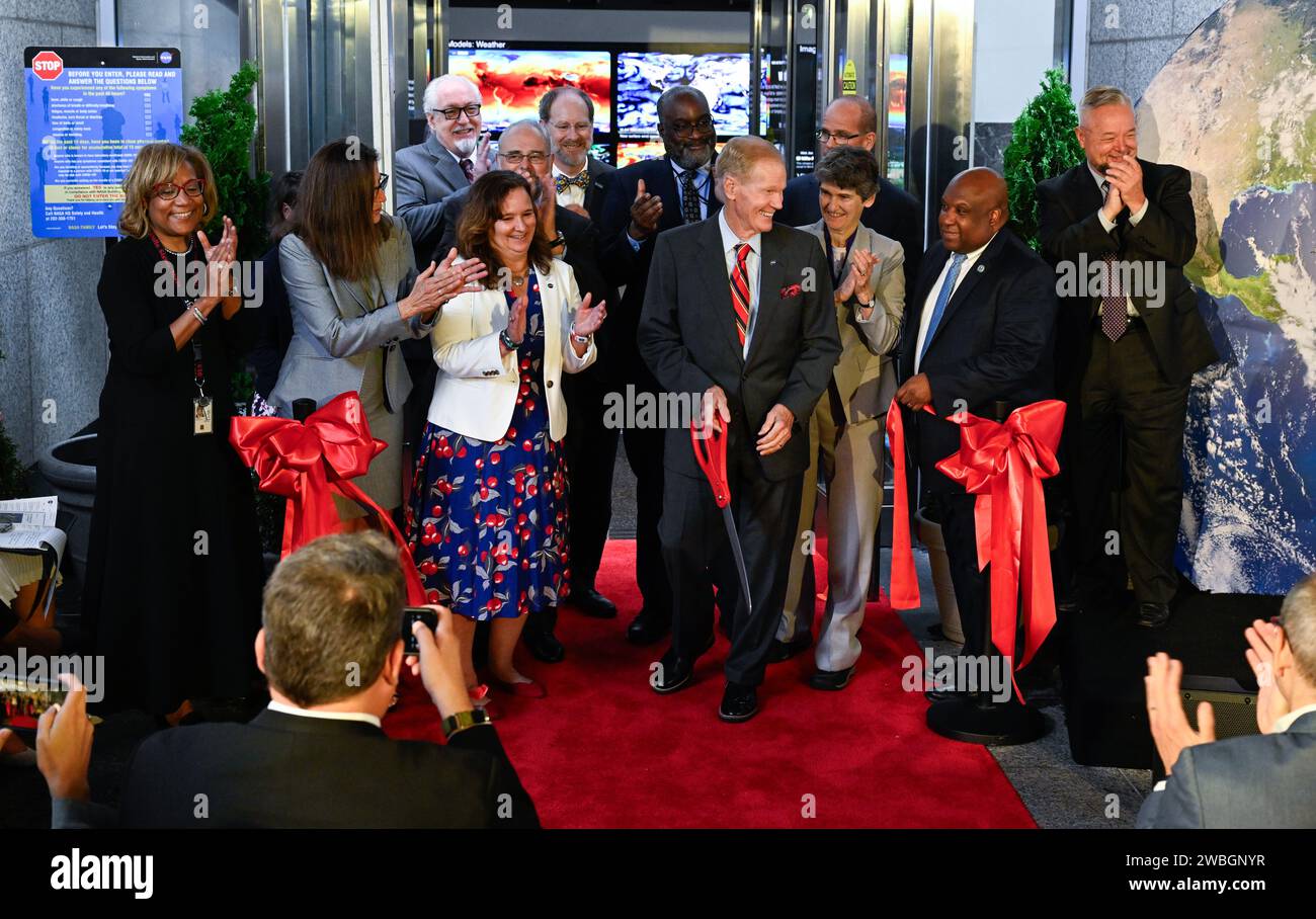 NASA Administrator Bill Nelson, center, cuts the ribbon to open NASA’s Earth Information Center alongside agency leadership and leadership from NOAA, USGS, USDA, USAID, EPA, and FEMA, Wednesday, June 21, 2023, at the Mary W. Jackson NASA Headquarters building in Washington. The Earth Information Center is new immersive experience that combines live data sets with cutting-edge data visualization and storytelling to allow visitors to see how our planet is changing.  Photo Credit: (NASA/Joel Kowsky) Stock Photo