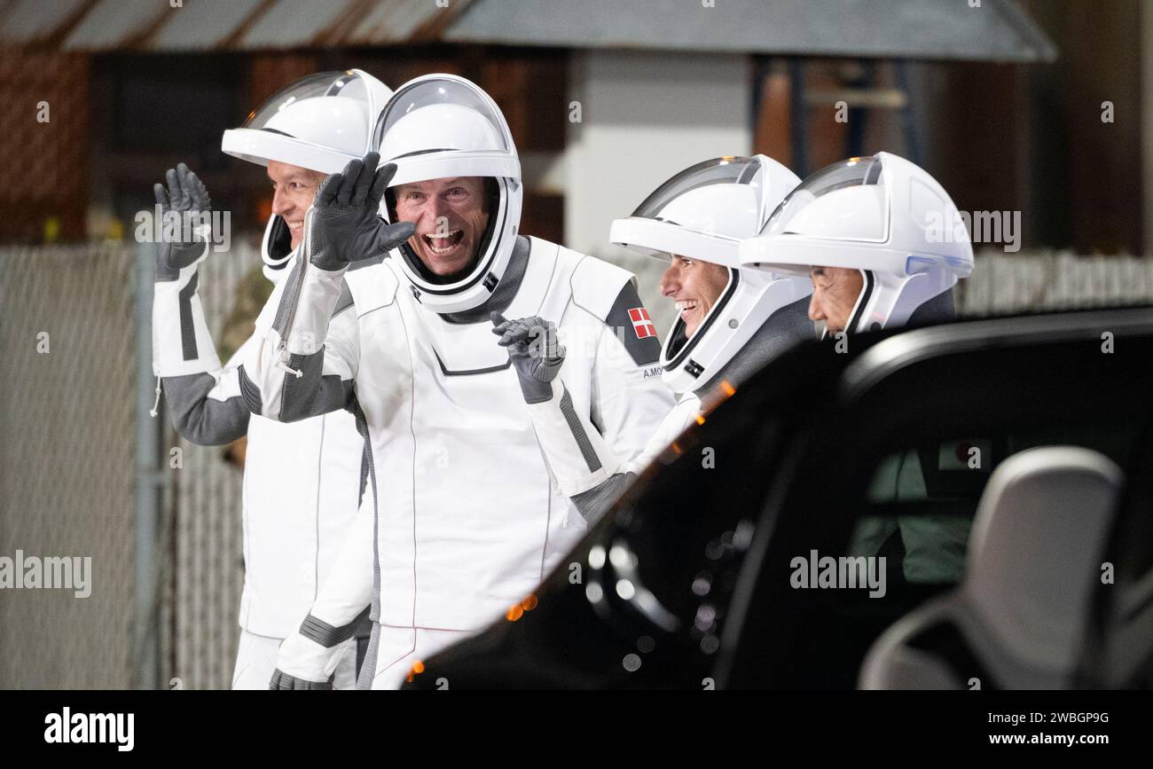 Roscosmos cosmonaut Konstantin Borisov, left, ESA (European Space Agency) astronaut Andreas Mogensen, second from left, NASA astronaut Jasmin Moghbeli, second from right, and Japan Aerospace Exploration Agency (JAXA) astronaut Satoshi Furukawa, right,  wearing SpaceX spacesuits, are seen as they prepare to depart the Neil  A. Armstrong Operations and Checkout Building for Launch Complex 39A to board the SpaceX Dragon spacecraft for the Crew-7 mission launch, Saturday, Aug. 26, 2023, at NASA’s Kennedy Space Center in Florida. NASA’s SpaceX Crew-7 mission is the seventh crew rotation mission of Stock Photo