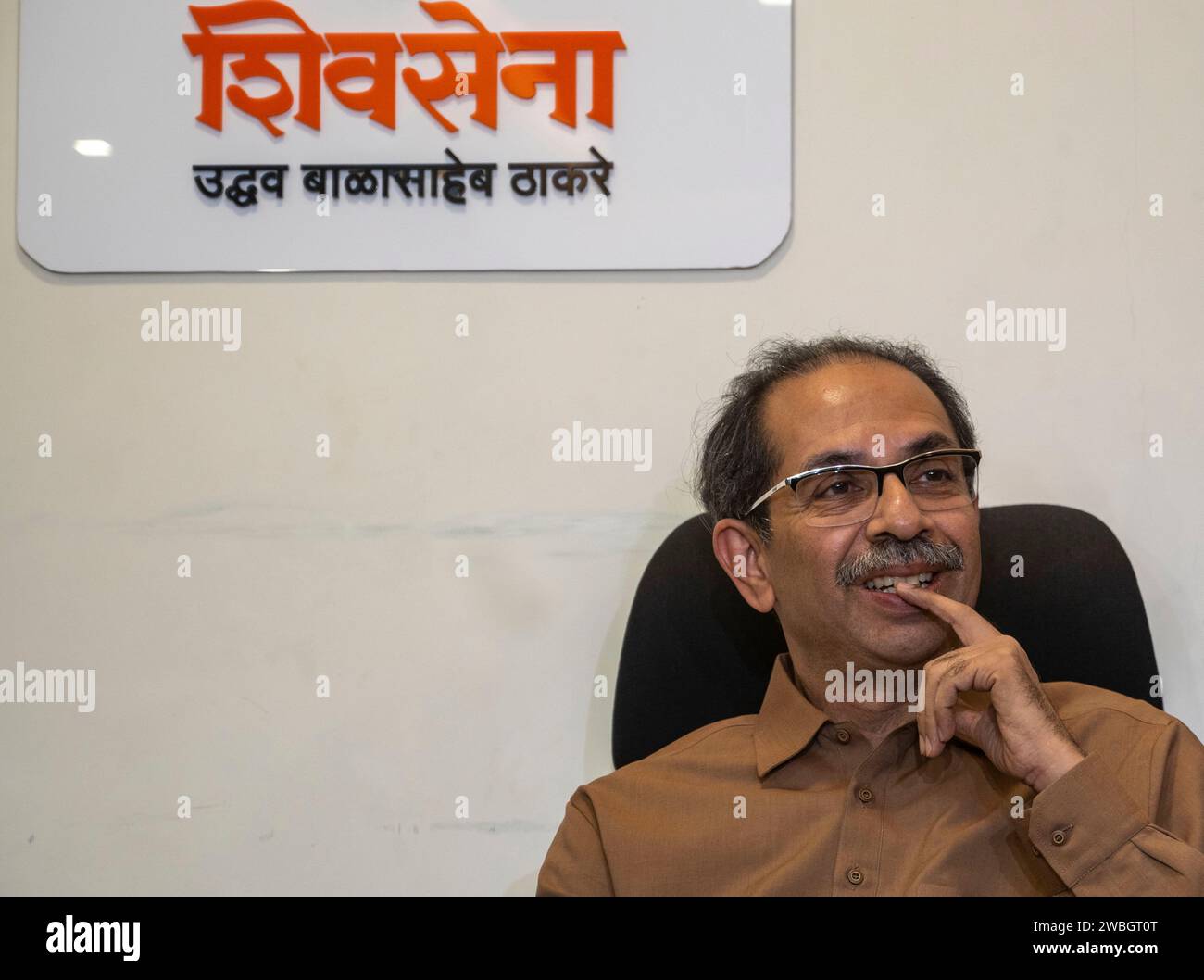 MUMBAI, INDIA - JANUARY 10: Uddhav Thackeray Member of the Maharashtra Legislative Council interact with media after verdict on sena MLAs disqualification at Bandra on January 10, 2024 in Mumbai, India. The Maharashtra Legislative Assembly Speaker Rahul Narwekar today held that Eknath Shinde led faction was the real Shiv Sena when the rival faction emerged within the party on June 22, 2022. He has refused to disqualify any member from both the factions, led by Shinde and Uddhav Thackeray. Both the factions had filed 34 petitions against each other before the speaker in 2022, seeking the disq Stock Photo