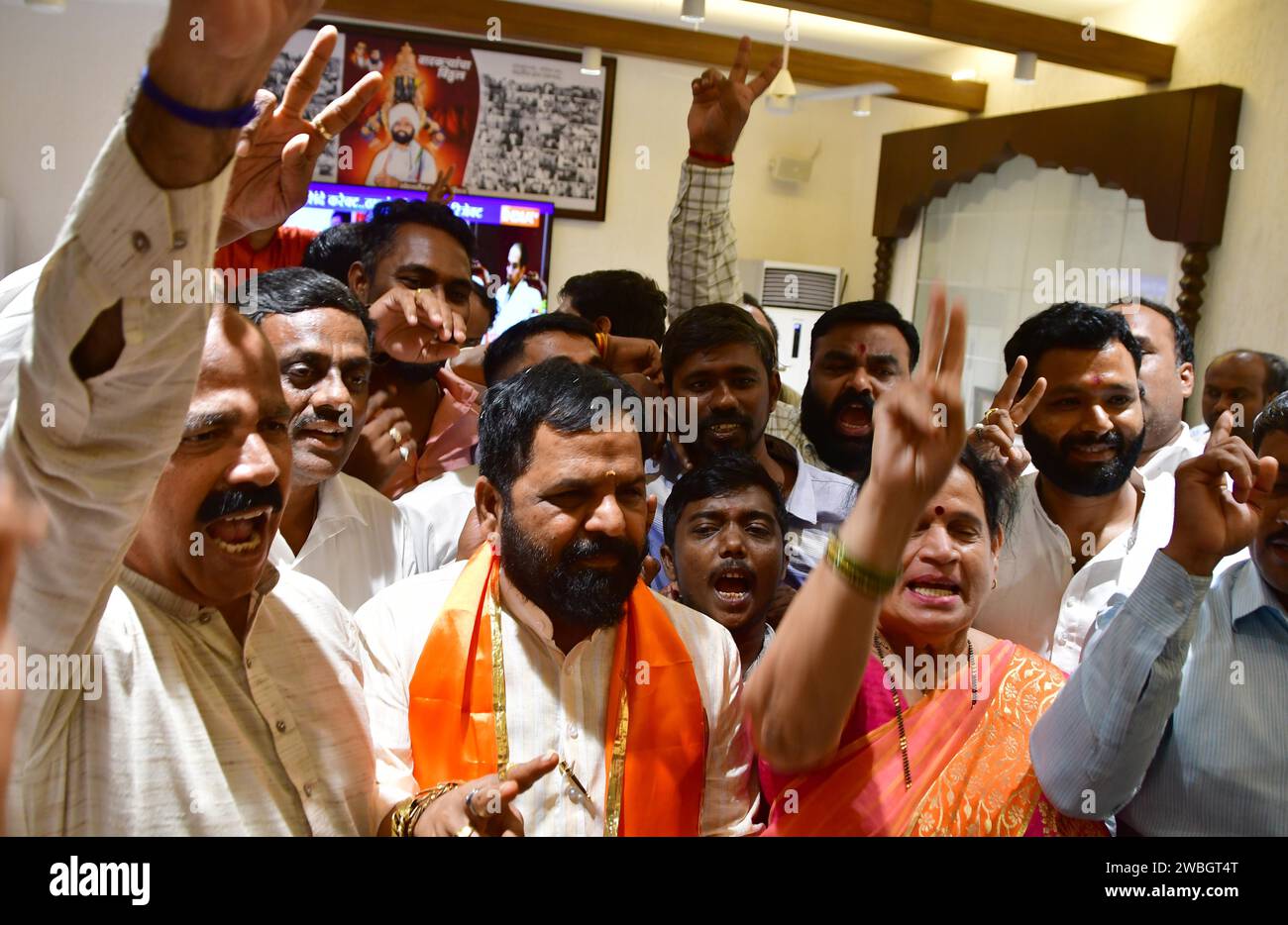 MUMBAI, INDIA - JANUARY 10: Shiv Sena (Shinde faction) MLA Bharat Gogawale with party leaders celebrate after the Shiv Sena MLA disqualification case verdict, at Balasaheb Bhavan on January 10, 2024 in Mumbai, India. The Maharashtra Legislative Assembly Speaker Rahul Narwekar today held that Eknath Shinde led faction was the real Shiv Sena when the rival faction emerged within the party on June 22, 2022. He has refused to disqualify any member from both the factions, led by Shinde and Uddhav Thackeray. Both the factions had filed 34 petitions against each other before the speaker in 2022, se Stock Photo