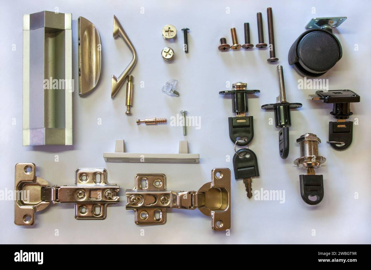 various handles, fasteners, locks, screws, for furniture isolated on