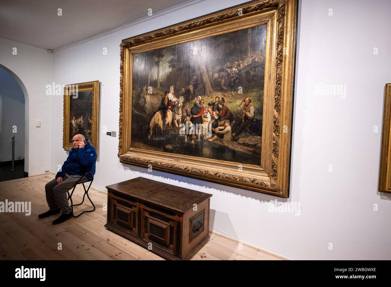 A Person Sits Near A Painting In The Exhibition Of The Artist Adolph A Person Sits Near A Painting In The Exhibition Of The Artist Adolph