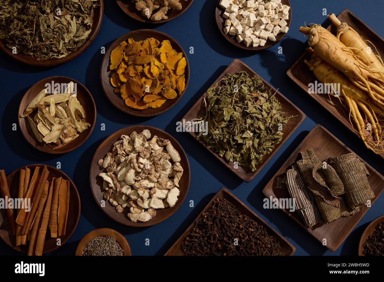 Over the blue background, many different types of traditional medicine