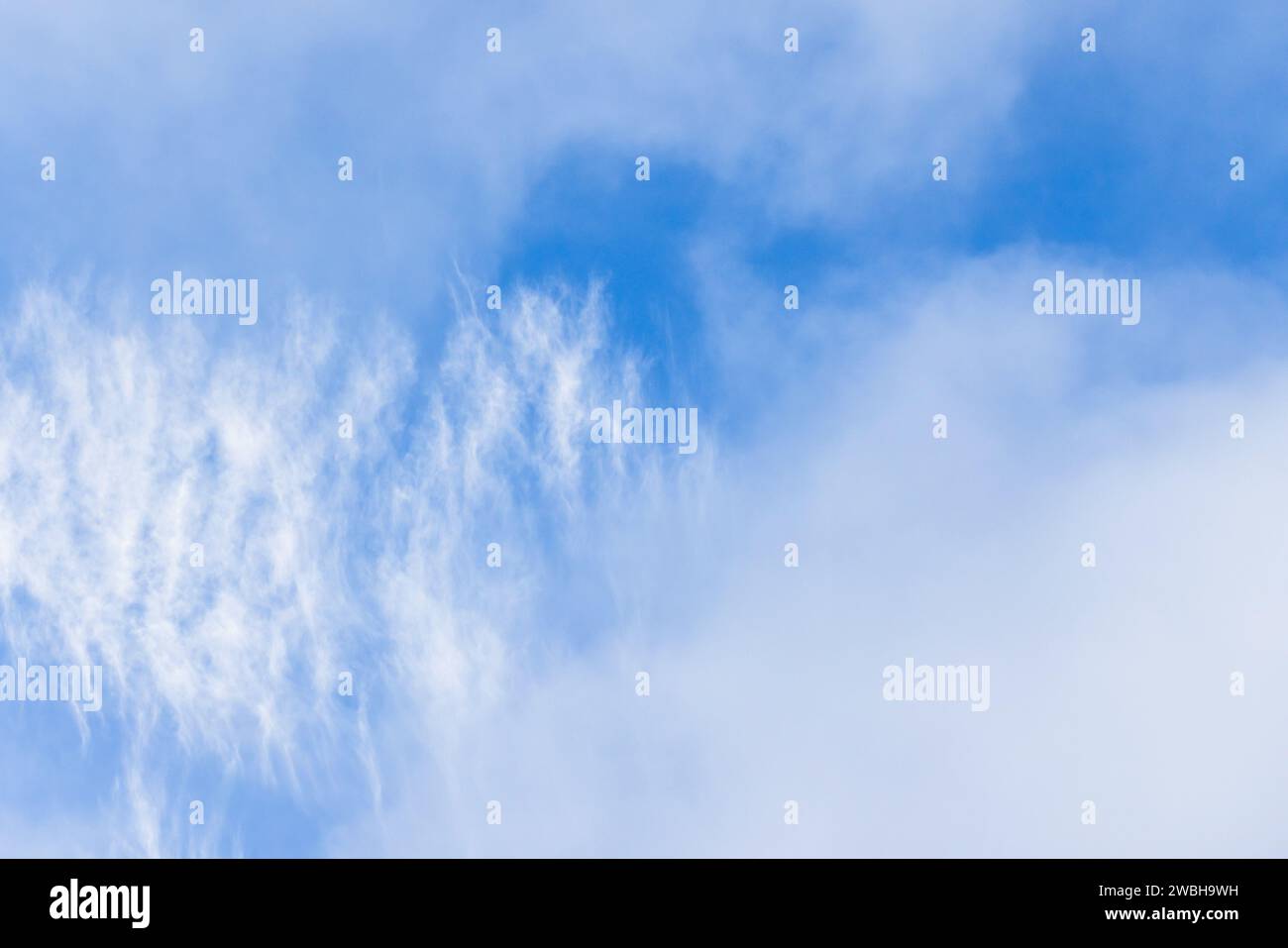 White clouds in blue sky, natural background photo taken on a sunny day Stock Photo