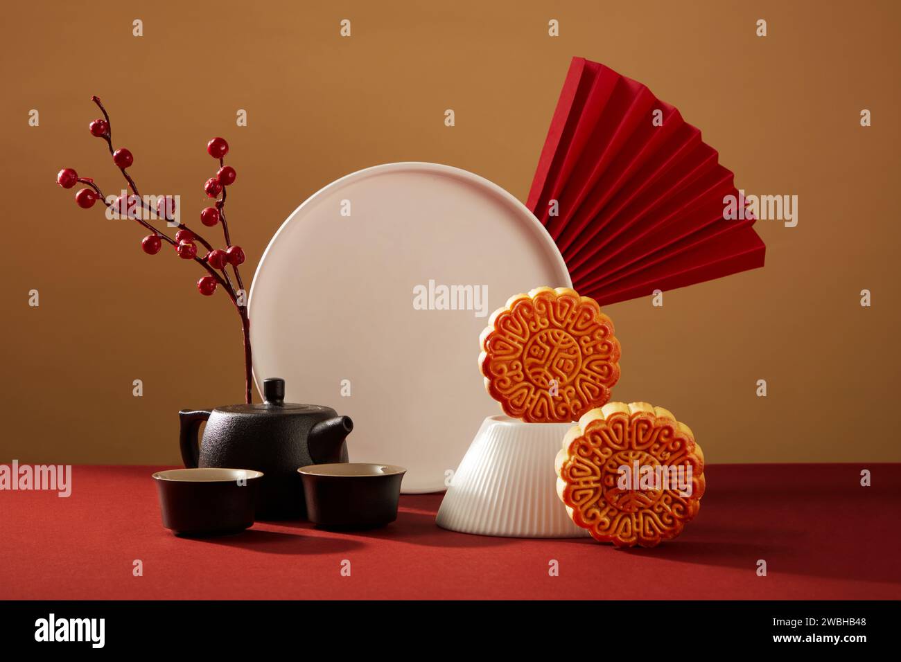 Concept of Mid Autumn Festival with a black tea set decorated with ...