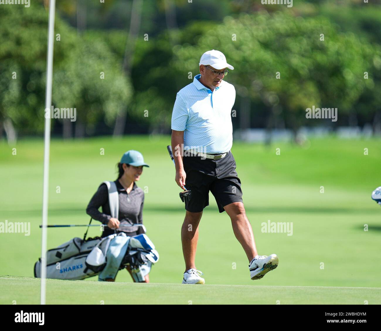 Honolulu, Hawaii, USA. 10th Jan, 2024. HPU Head Coach Ed Kageyama of the golf team walks on the