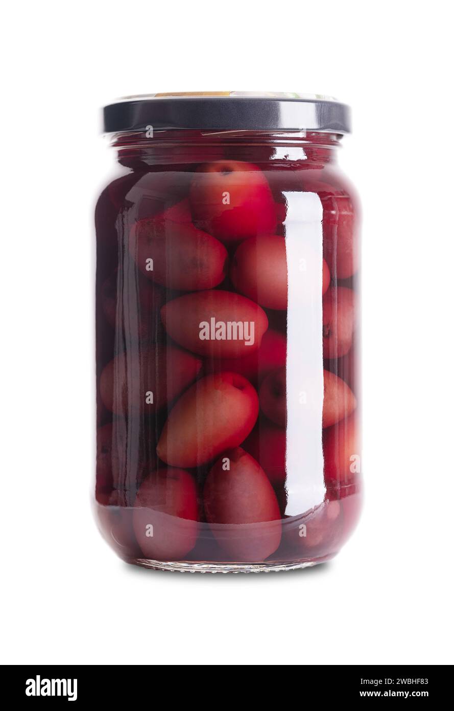 Kalamata olives, pickled whole, large and dark purple table olives, in a glass jar with screw cap. Olive variety from Kalamata region in Greece. Stock Photo