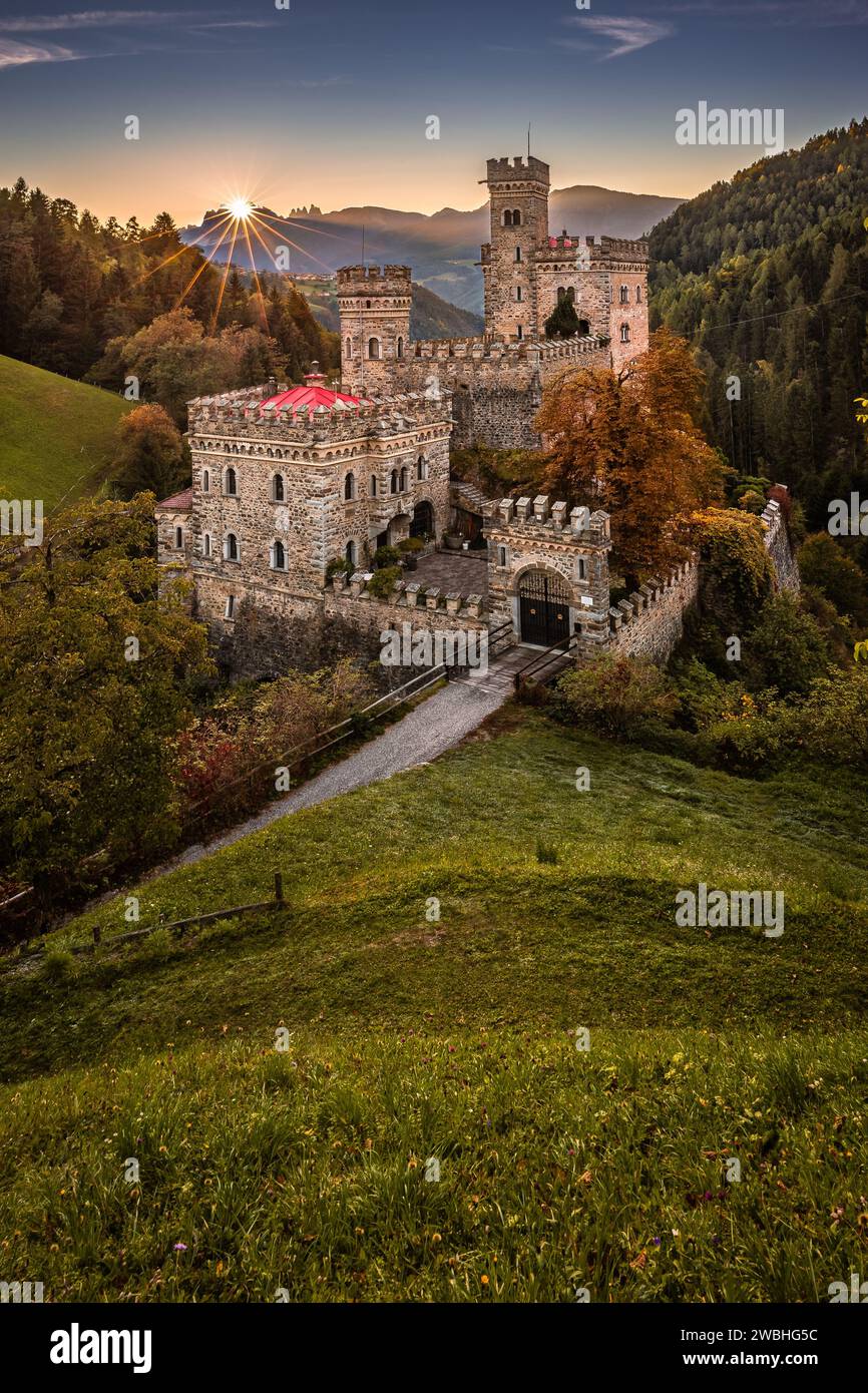 Latzfons, Italy - Beautiful autumn scenery at Gernstein Castle (Castello di Gernstein, Schloss Gernstein) at sunrise in South Tyrol with blue sky and Stock Photo