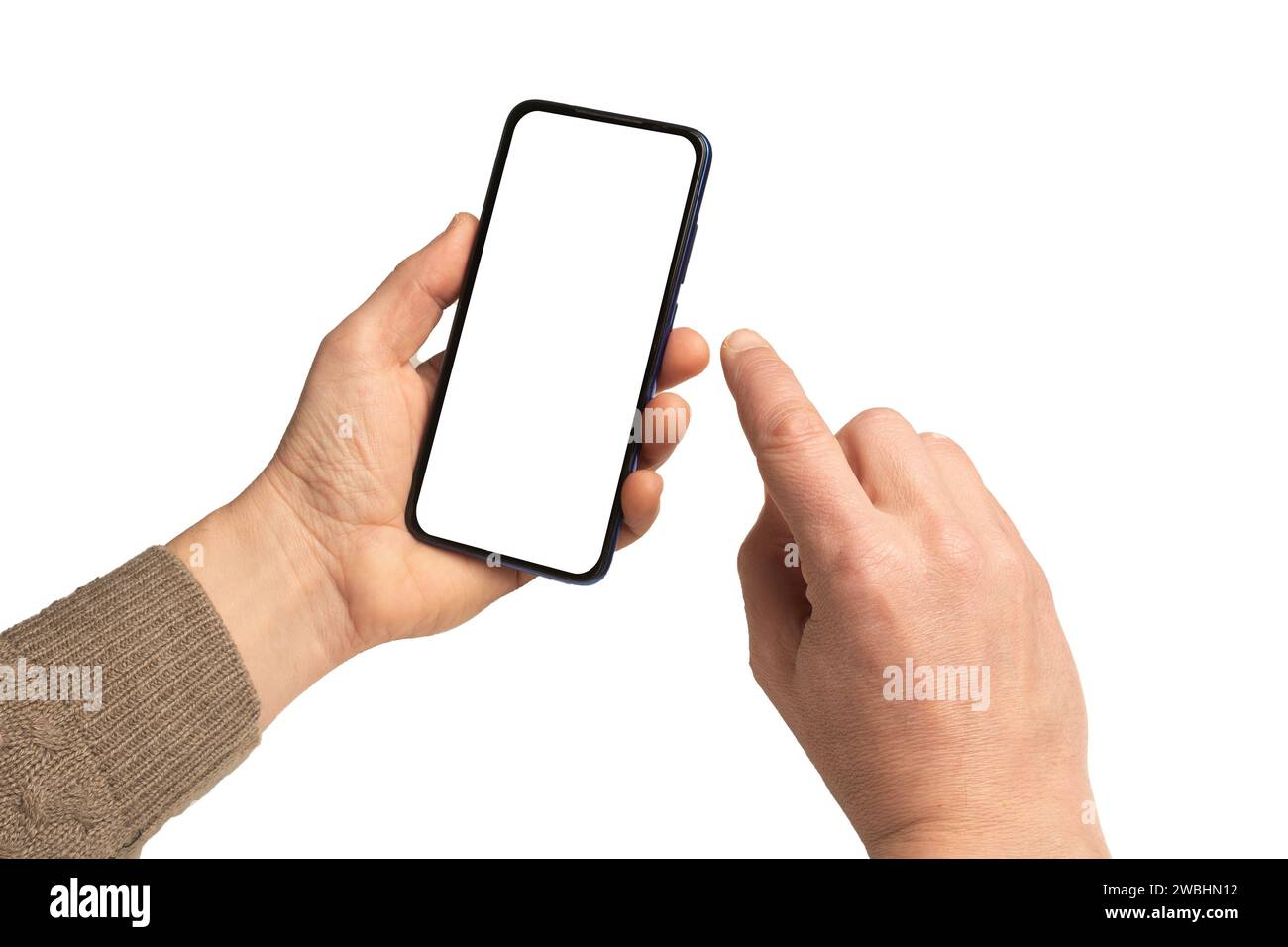 Man using a blank screen smartphone isolated on white background Stock Photo
