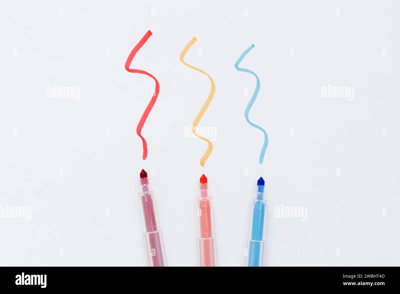 markers and colorful hand drawn lines on white paper background Stock ...
