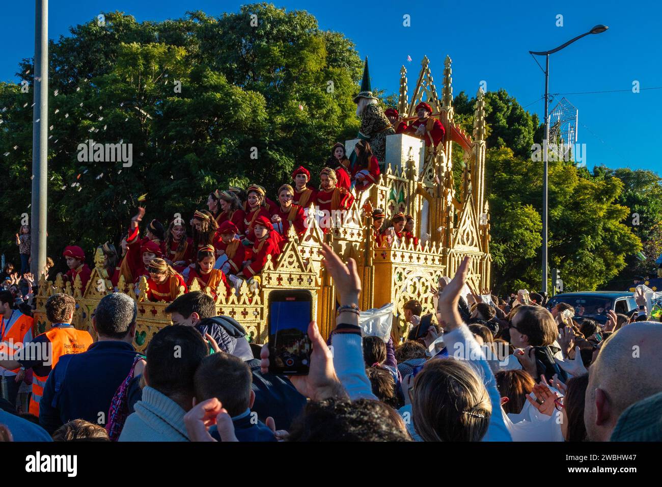 Large crowds at the three wise men parade in Seville. The parade is a start to the magical night for kids, with loads of presents brought to their hou Stock Photo