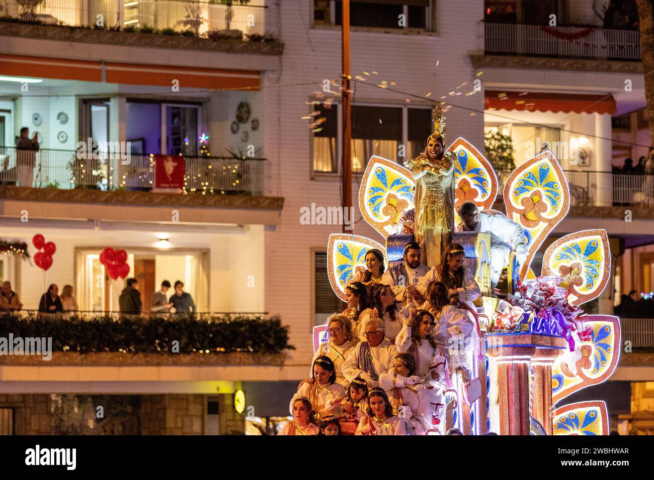 Large crowds at the three wise men parade in Seville during the evening. The parade is a start to the magical night for kids, Stock Photo