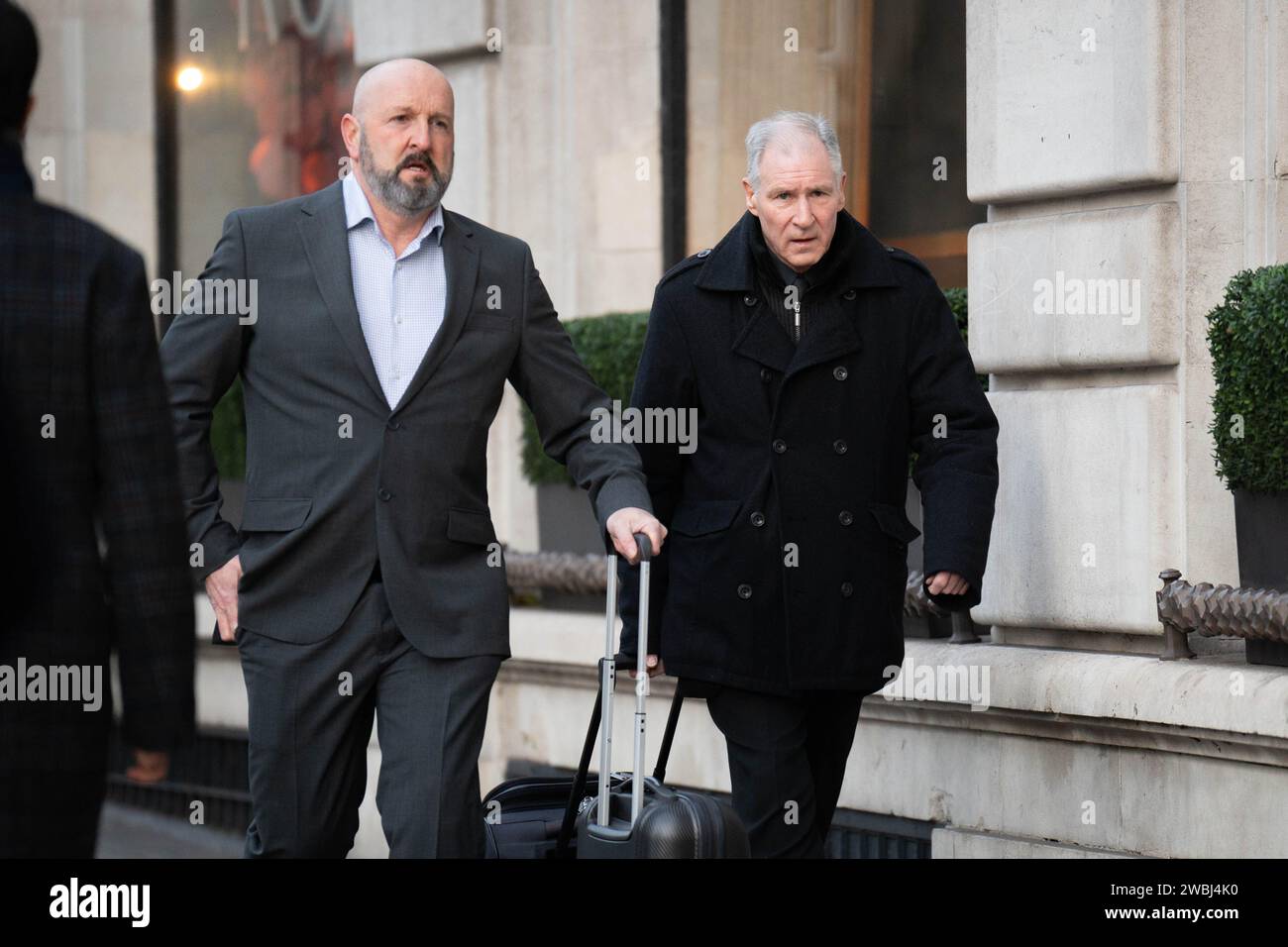 Post Office investigator Stephen Bradshaw (right) arrives at Aldwych House, central London, to