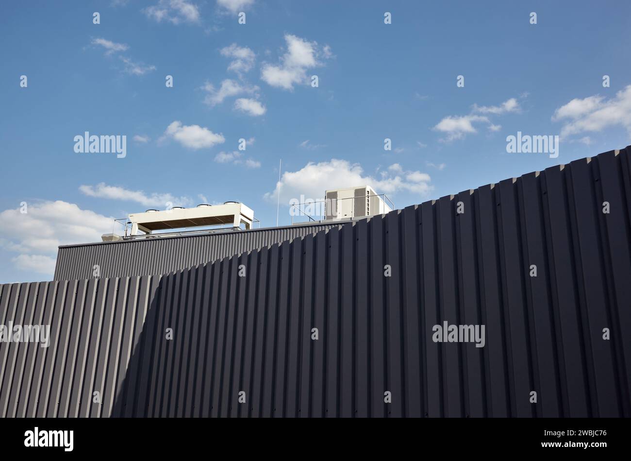 Corrugated iron sheet fence, Facade of a warehouse or factory