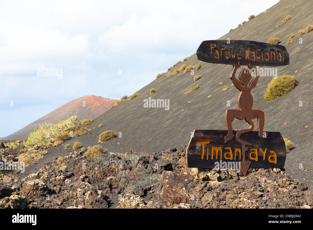 Devil sign at the entrance to Timanfaya National Park on Lanzarote.  The figure represents a dancing devil Stock Photo
