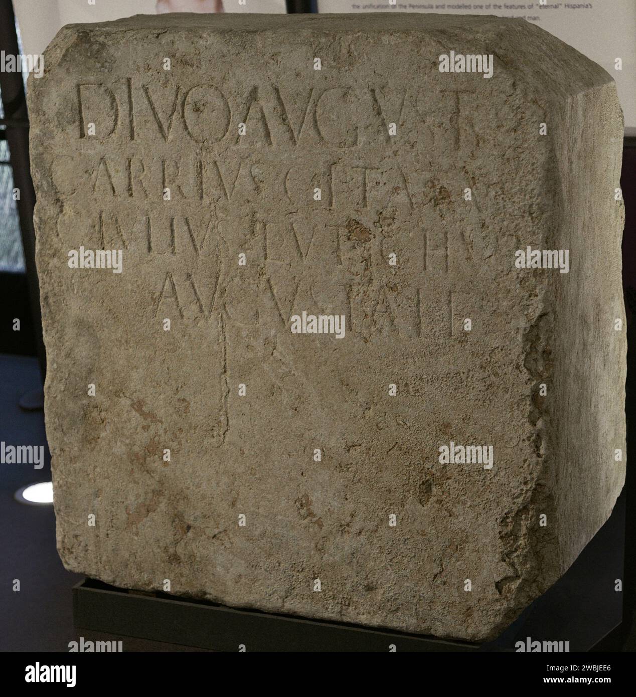 Pedestal in honor of the Divine Augustus, by Caius Arrius Optatus and Caius Iulius Eutychus, two municipal augustalis. Inscription: 'To the divine Augustus. Caius Arrius Optatus and Caius Iulius Eutychus, augustales'. The pedestal would have sustained a statue of the emperor located originally in the forum of the city of Felicitas Iulia Olisipo. 1st century AD. From Largo do Contador-Mor, nr. 3 and 4, parish of Santa Maria Maior, Lisbon. Portugal. National Archaeology Museum. Lisbon, Portugal. Stock Photo