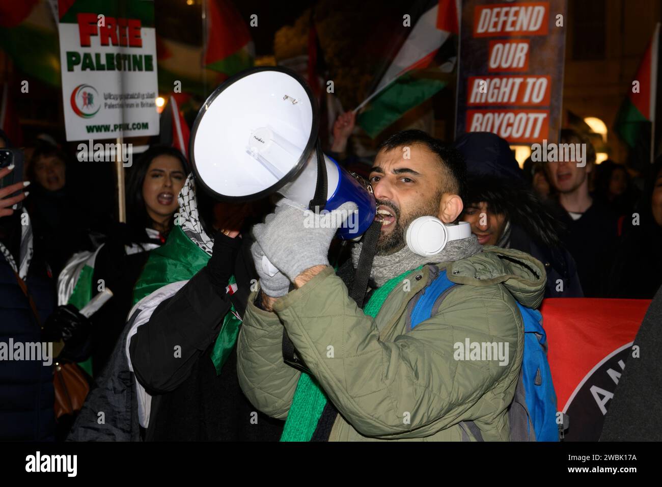 A protest mainly by pro-Palestine demonstrators outside the Houses of Parliament against the new 'Economic Activity of Public Bodies (Overseas Matters Stock Photo