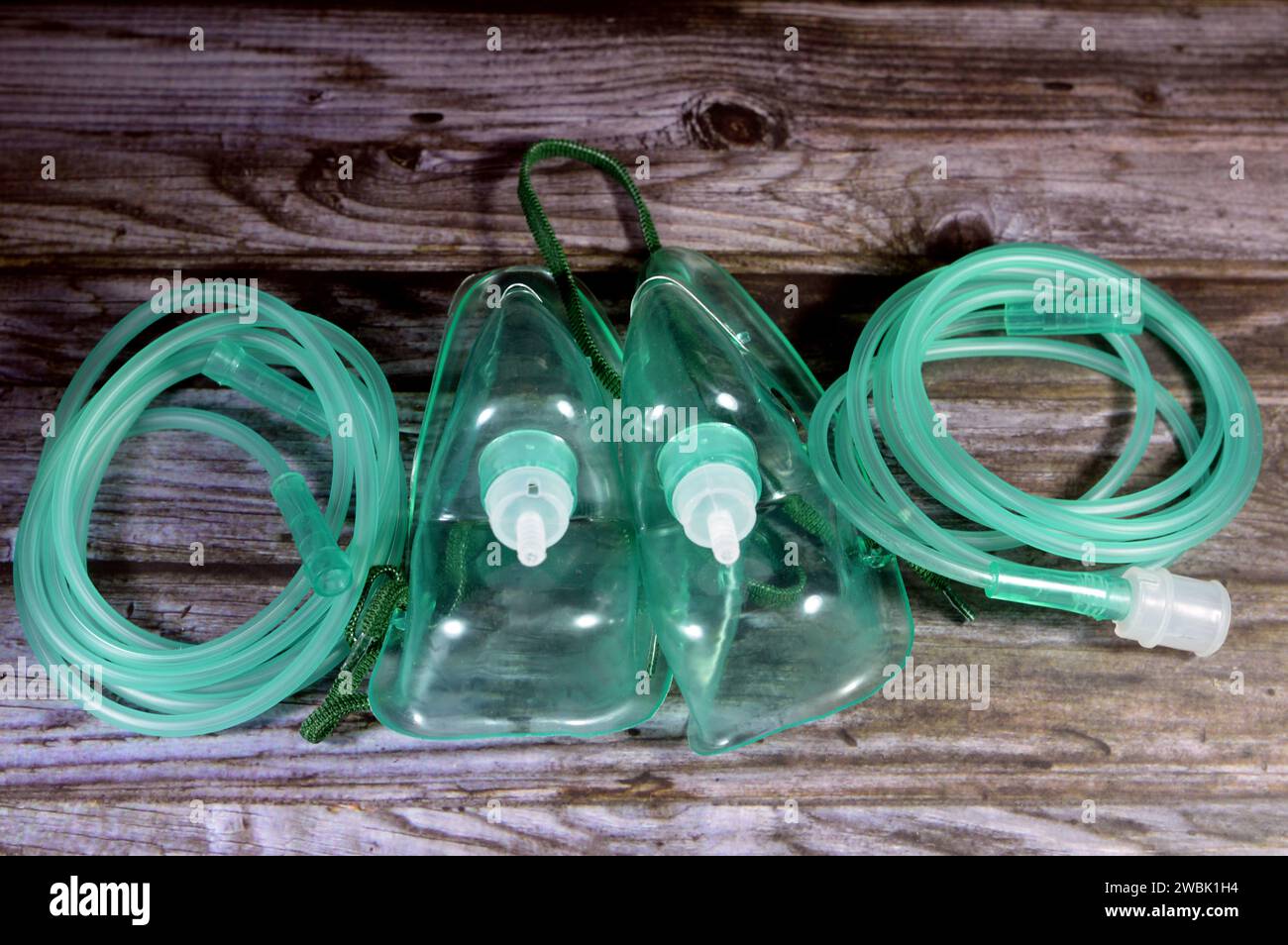 Oxygen mask, a mask that provides a method to transfer breathing oxygen gas from a storage tank to the lungs, Oxygen masks may cover only the nose and Stock Photo