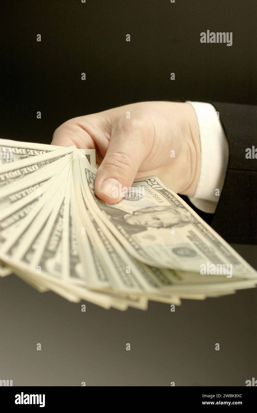 Dollarscheine in der Hand, 2005 , BLF *** Dollar bills in the hand, 2005 , BLF BL46074 Stock Photo