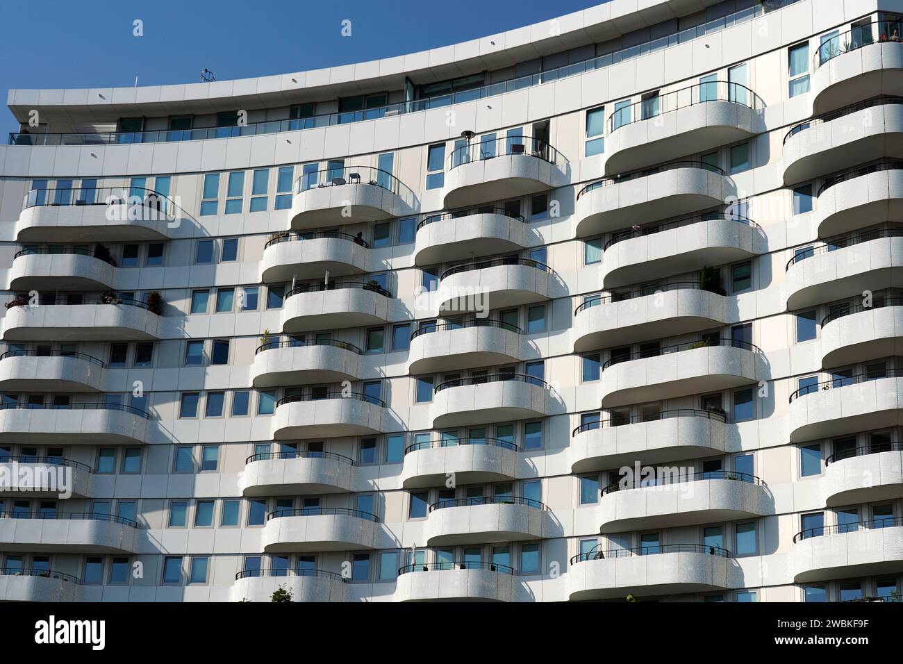 Germany, North Rhine-Westphalia, Cologne, modern residential complex, facade, curved balconies Stock Photo