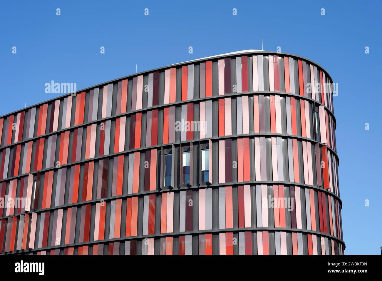 Germany, North Rhine-Westphalia, Cologne, office building with colorful ...