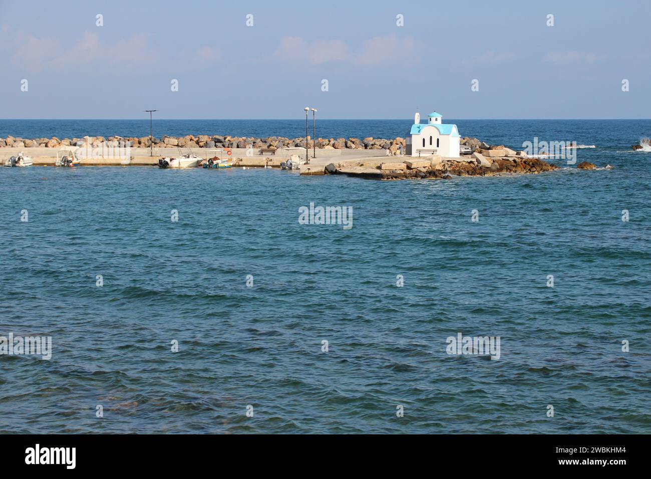 orthodox church (agios dionysios d'olymbos) and mediterranean sea  in galatas in crete in greece Stock Photo