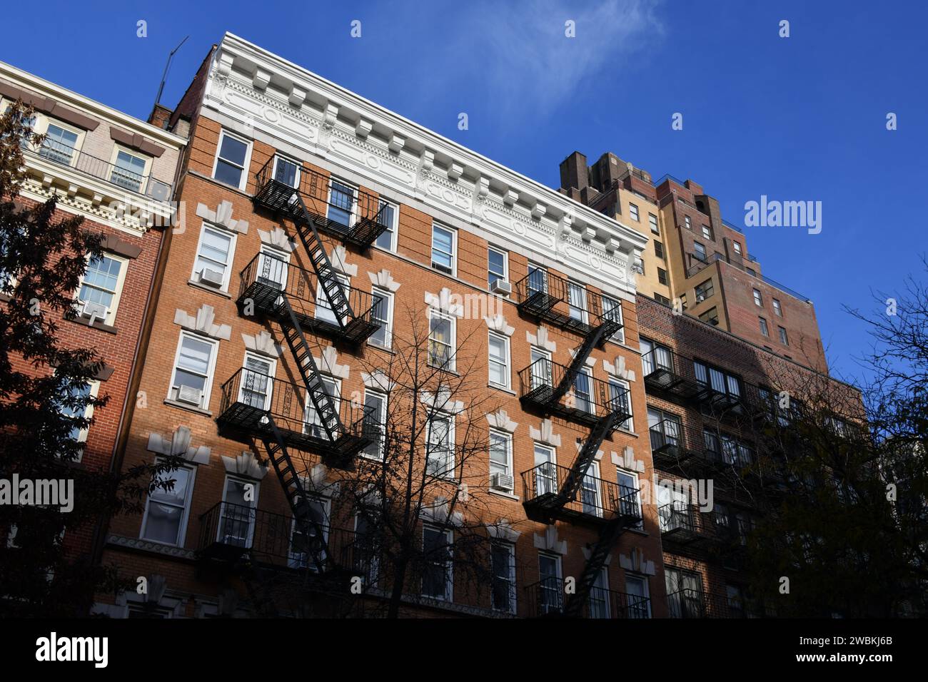 Apartment building in Greenwich Village Manhattan New York City USA with Fire Escape ladders Stock Photo