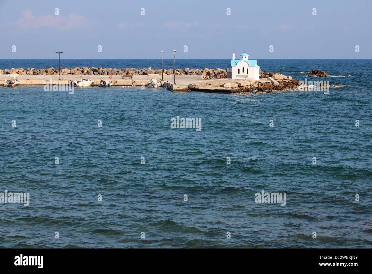 orthodox church (agios dionysios d'olymbos) and mediterranean sea  in galatas in crete in greece Stock Photo