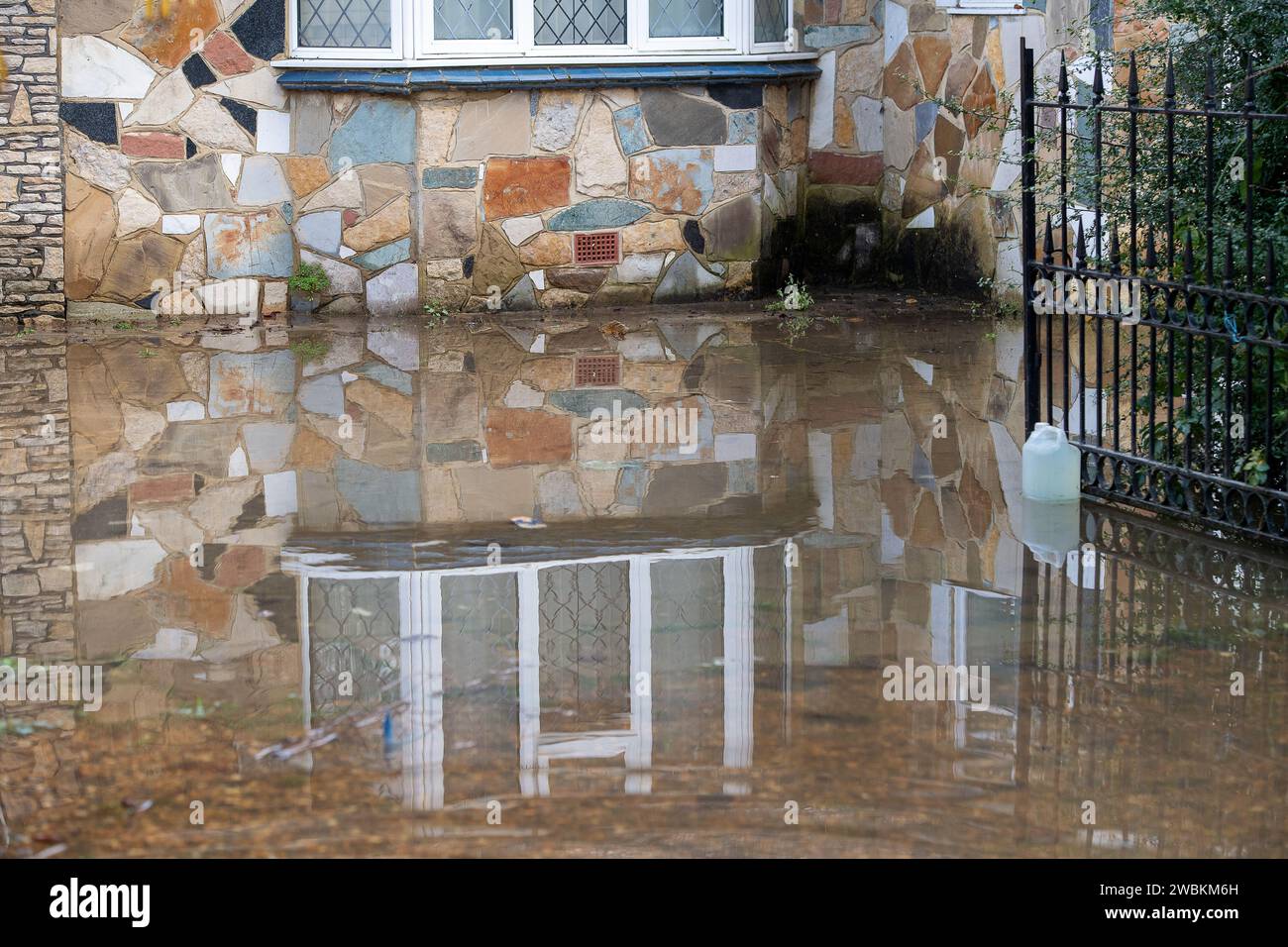 Wraysbury, UK. 11th January, 2024. Some gardens remain flooded in