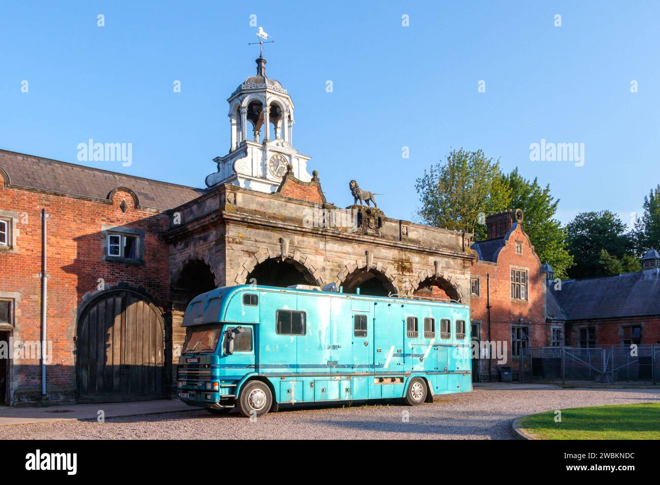 blue horsebox trailer truck parked outside ingestre hall stables in stafford staffordshire Stock Photo
