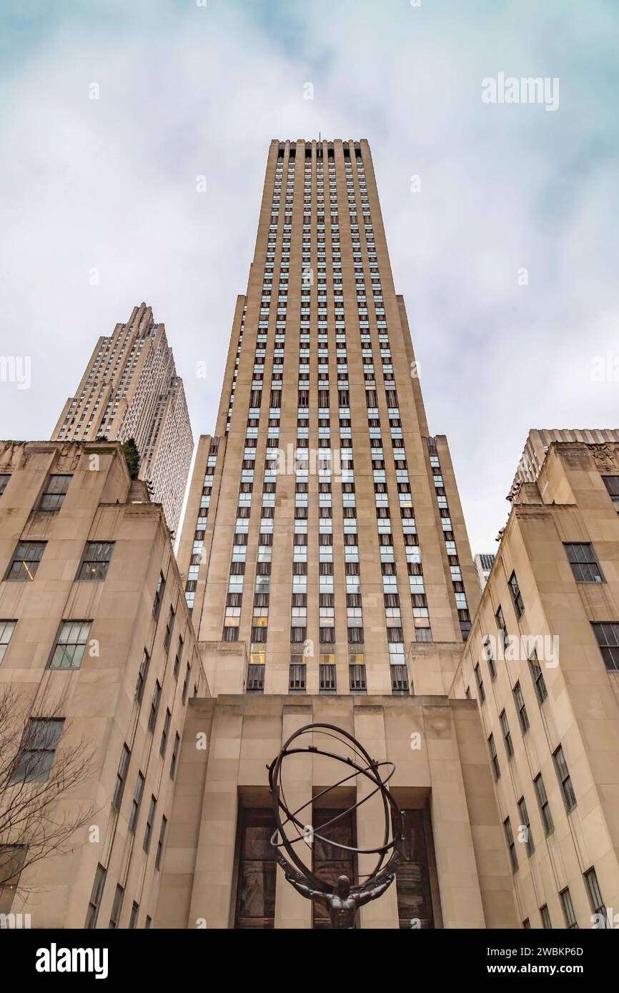 NEW YORK, USA-MARCH 6, 2020: Atlas, a bronze statue in Rockefeller Center, Midtown Manhattan. It is across on Fifth Avenue in St. Patrick's Cathedral Stock Photo