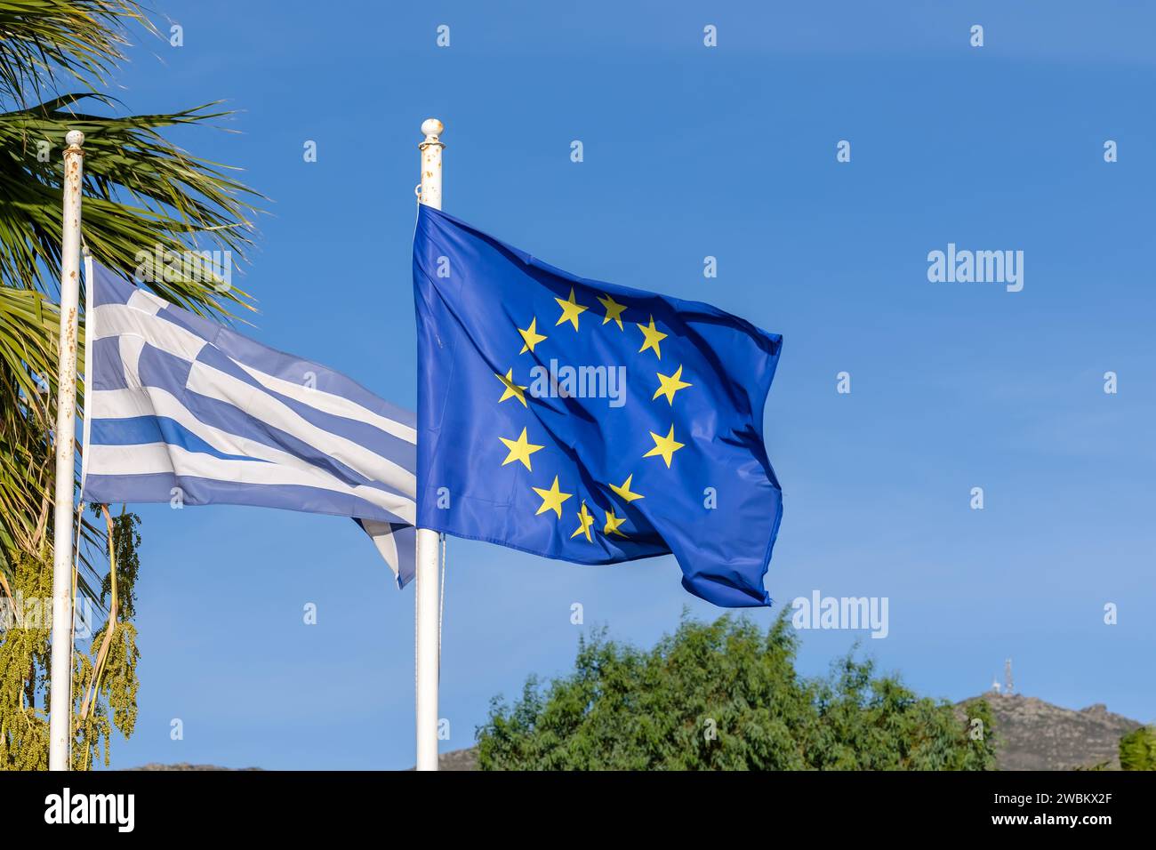 View the Greek national flag and the flag of the European community Stock Photo