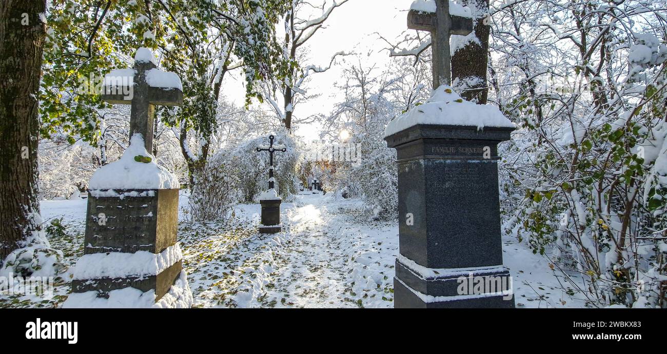 Winter view of famous Old North Cemetery of Munich, Germany with historic gravestones. Funerals have not been held here since 1944. Instead, the cemet Stock Photo