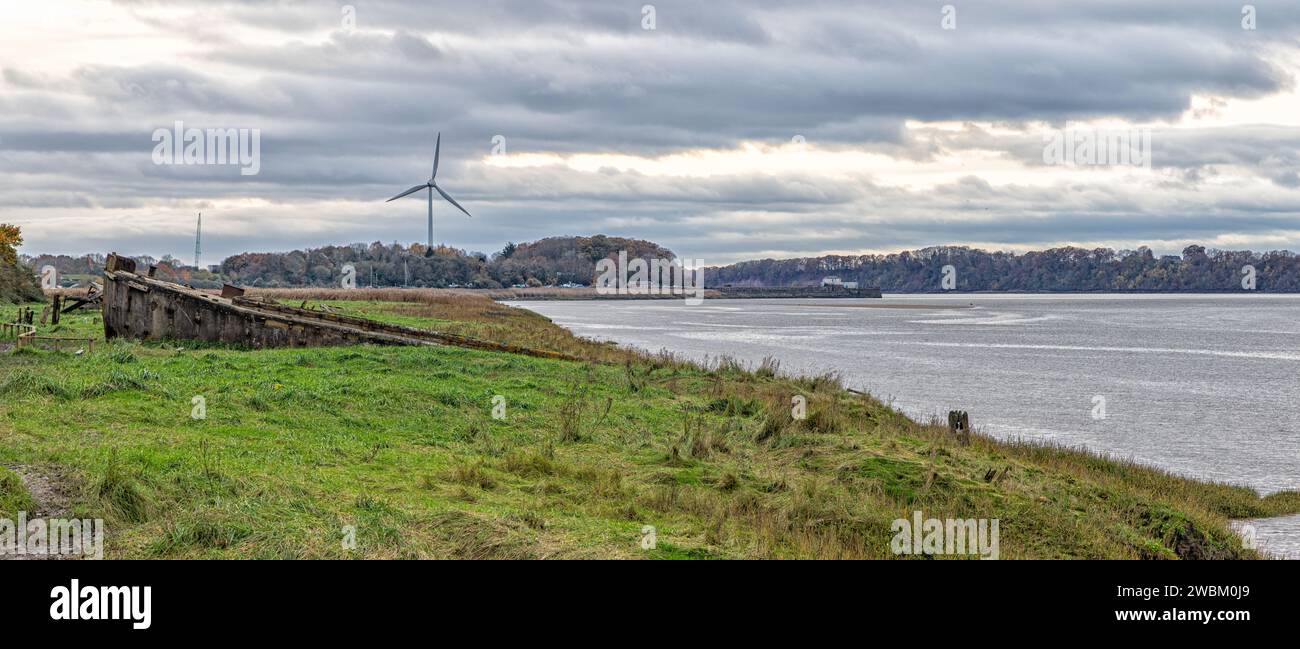 View of the Purton Ships Graveyard or Purton Hulks with Sharpness old docks in the background, Gloucestershire, United Kingdom Stock Photo
