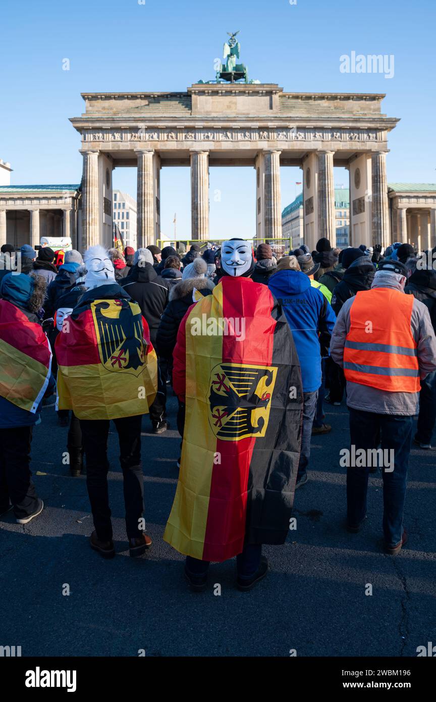 08.01.2024, Berlin, Germany, Europe - Farmers protest at the Brandenburg Gate against the politics and austerity plans of the government. Stock Photo