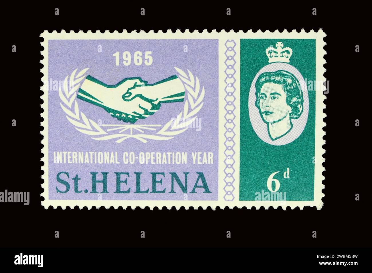 Postage stamp of St Helena effigy of Queen Elizabeth II stamp issue celebrating 1965 year of international co operation stamp collecting hobby Stock Photo