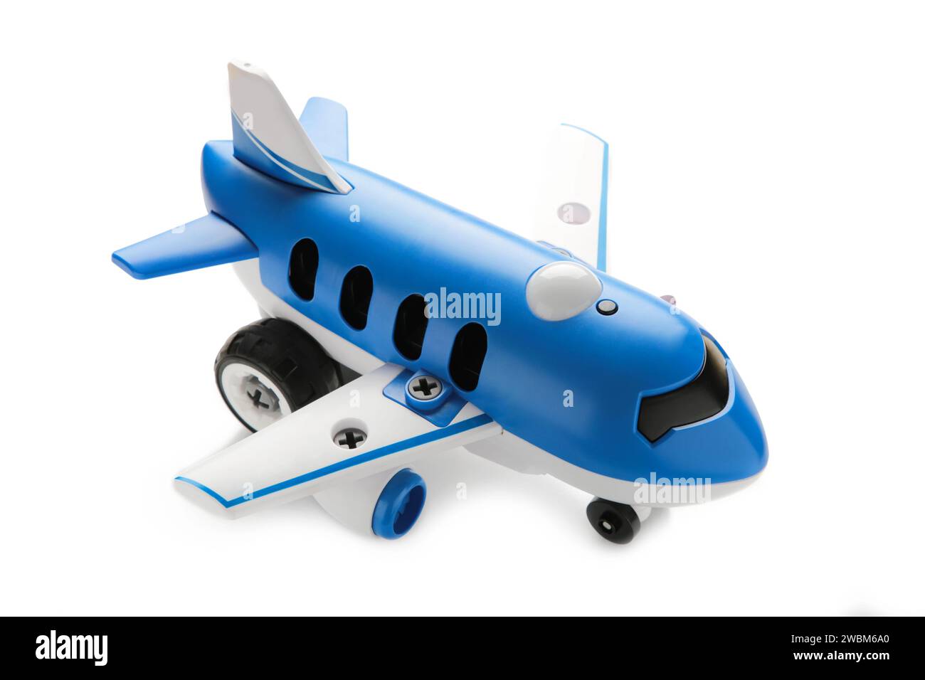 Plastic toy plane isolated on white background. Top view Stock Photo