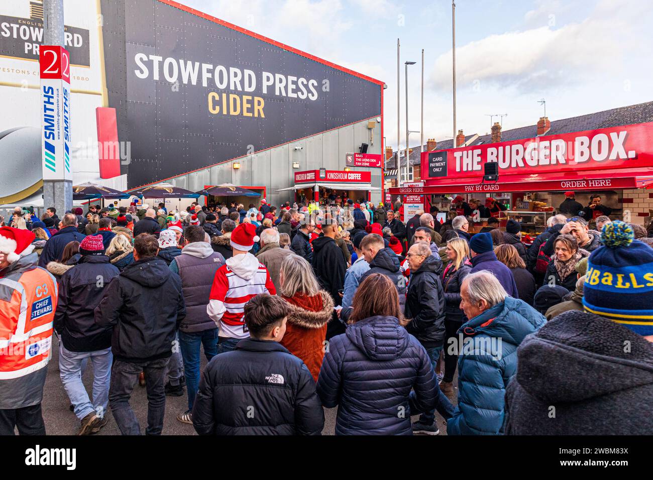 Fans entering Kingsholm Stadium, home of Gloucester Rugby, for the match with Northampton on 23/12/2023, Gloucester, England UK Stock Photo