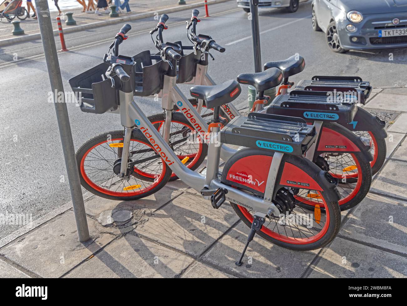 Thessaloniki, Greece - October 22, 2023: Electric Bikes for Rent Ridemovi Parked at Street in City Centre. Stock Photo