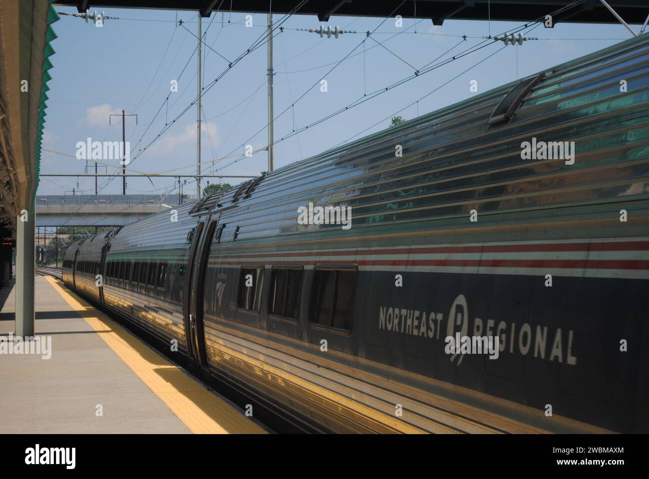 A photo of an Amtrak Northeast Regional train going through the ...