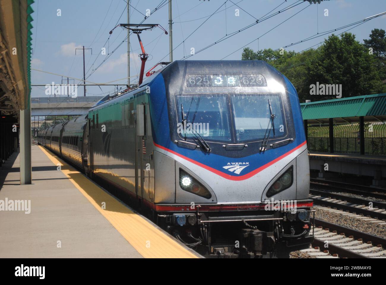 A photo of an Amtrak Northeast Regional train going through the Halethorpe, MD train station
