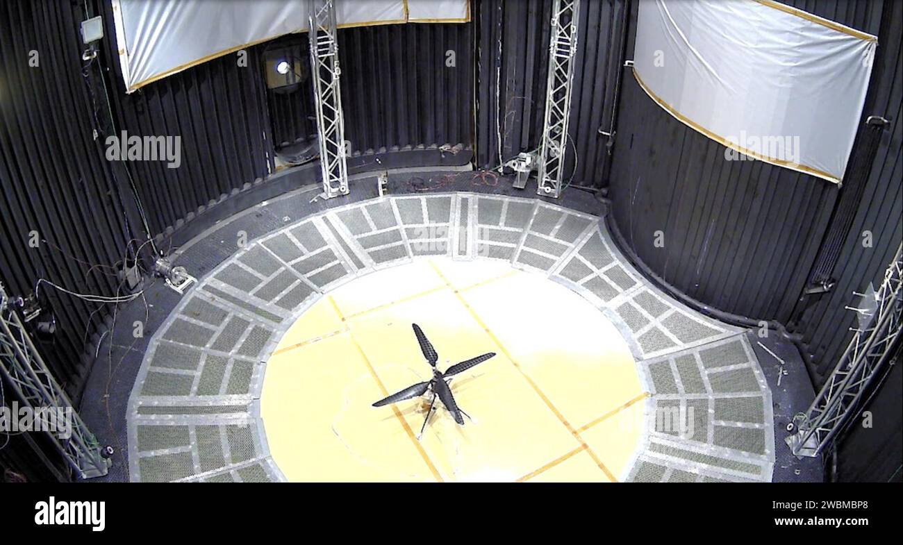 This image shows a test flight of a full-scale prototype of the Ingenuity Mars Helicopter. The flight took place on May 31, 2016, in the 25-foot-wide, 85-foot-tall (8-meter-by-26-meter) Space Simulator Facility at NASA's Jet Propulsion Laboratory in Southern California. The flight was the first demonstration that powered-controlled flight could be successfully executed in Mars-like conditions. The simulator's vacuum chamber allows engineers to test spacecraft and components in conditions like those they would face on Mars. Stock Photo