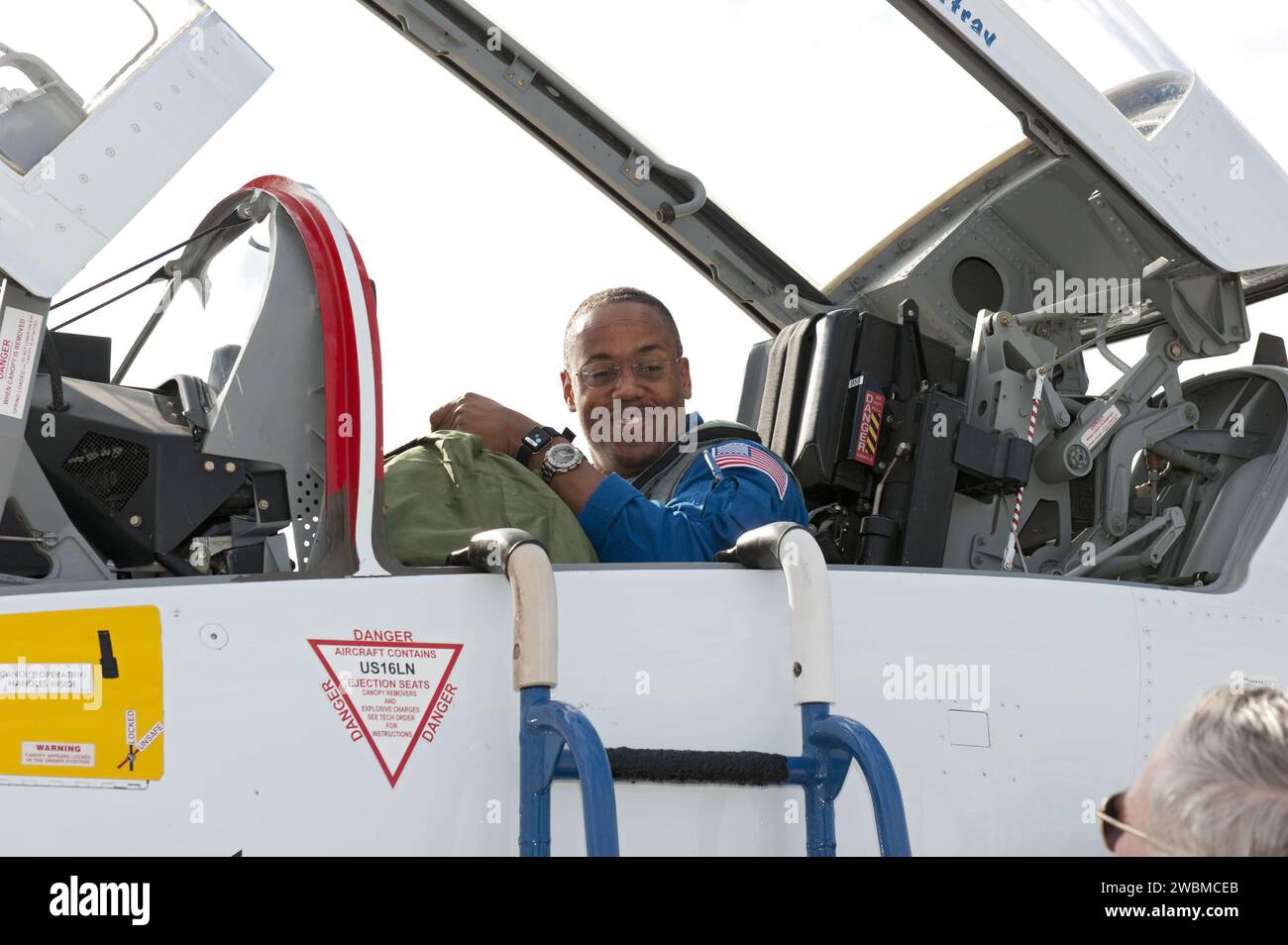 CAPE CANAVERAL, Fla. -- At NASA's Kennedy Space Center in Florida, space shuttle Discovery's STS-133 Mission Specialist Alvin Drew arrives on the Shuttle Landing Facility runway aboard a T-38 jet. In the days leading up to their launch to the International Space Station, Drew and his crew members will check the fit of their launch-and-entry suits, review launch-day procedures, receive weather briefings and remain medically quarantined to prevent sickness. This will be the second launch attempt for Discovery's crew, following a scrub in November 2010 due to a hydrogen gas leak at the ground umb Stock Photo