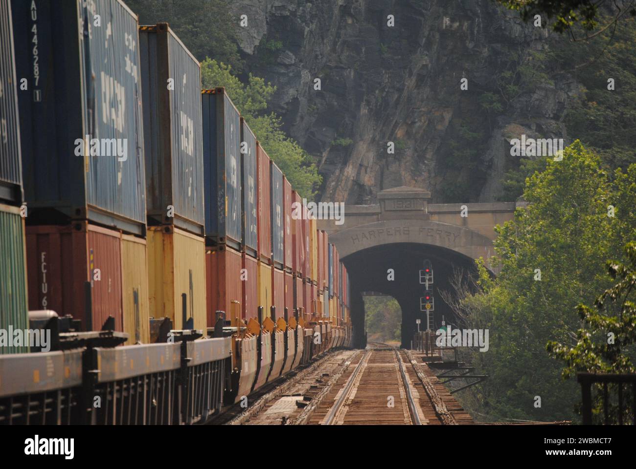 Here is a photo of a double stack intermodal CSX train passing through