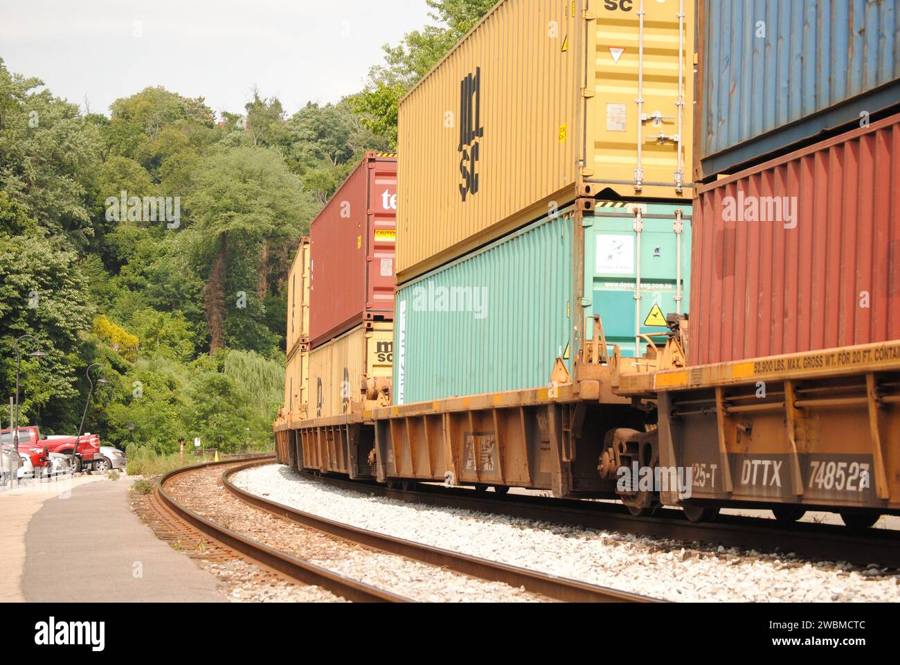 Here is a photo of a double stack intermodal CSX train passing through Harpers Ferry, WV. Stock Photo