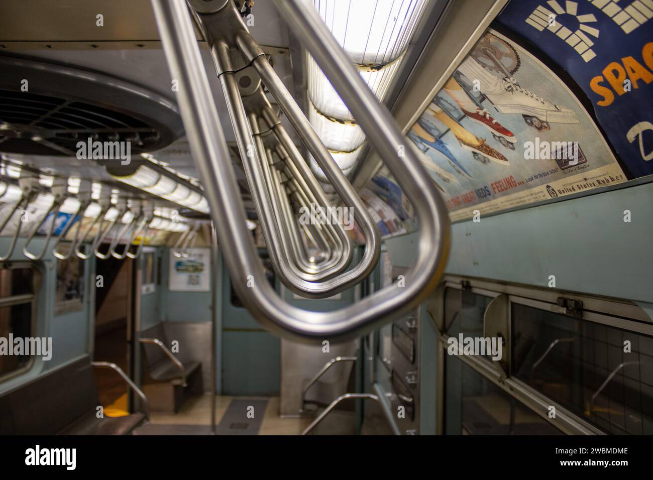 A modern train car equipped with an interior staircase and exterior window, perfect for commuters and travelers Stock Photo
